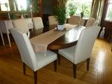 Solid mahogany pedestal ding table
54" w by 96" l
Four 10.5" leaves all with full apron
8 upholstered parsons chairs from Beacon Hill Showroom at Boston Design Center