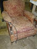 It's an upholstery project. Chair has great bones.
victorian arm chair with mahogany arms and ball and claw feet