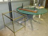 brass and glass side table
wrought iron round outdoor table