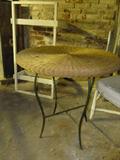rattan topped and metal leg tabl
