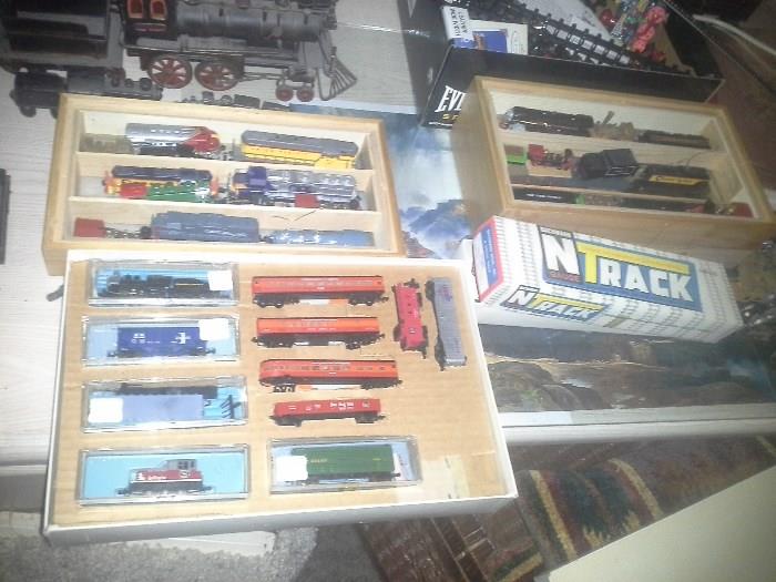 Some of the N-gauge and HO-gauge locomotives, cars and track items. Also some larger, hand-made metal railroad items.