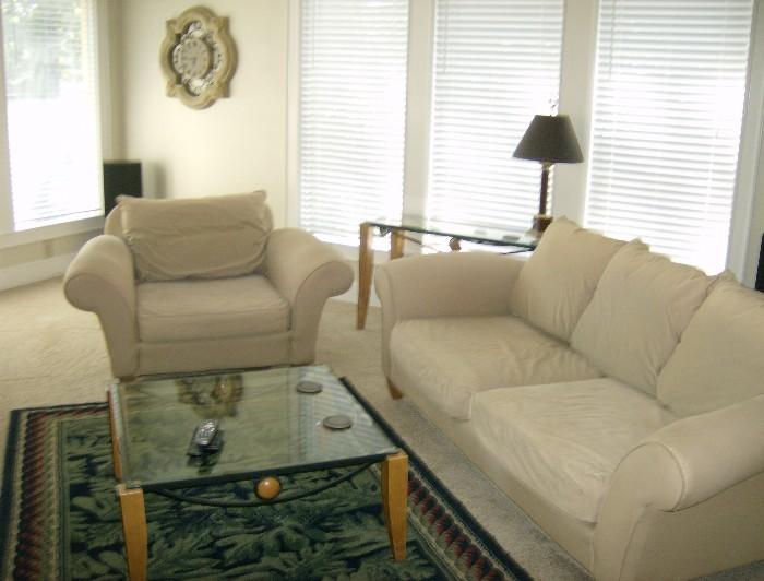 White sofa, chair and love seat