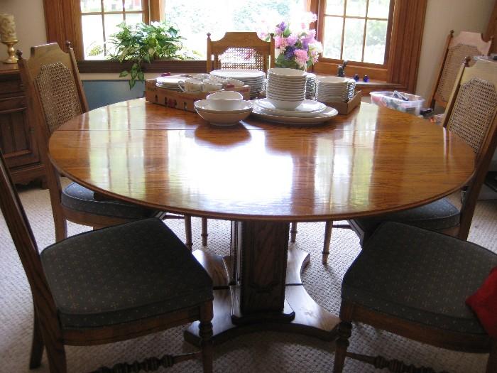 Antique oak 60" dining table & 2 - 18" leafs & 6 chairs $500
