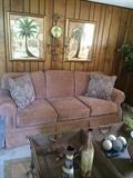 Fabulous  clean, comfy casual Broyhill couch, two of several palm tree prints and fun rattan double basket coffee table.