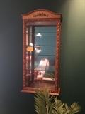 Gorgeous wall hanging curio cabinet.