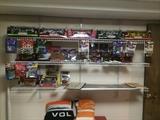 Wall of NASCAR model cars and Vols blanket and snuggie