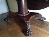 Exquisite antique cherry drop leaf table.  