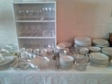 Antique white dishes and crystal.
