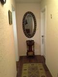 Antique mirror, antique hall stand, rug