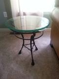 glass and wrought iron table