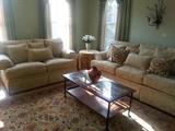 Huffman Koos custom made heavy damask sofa and loveseat with oriental rug