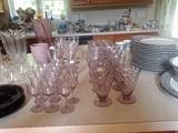 lilac glassware, water, wines, champagne, dessert