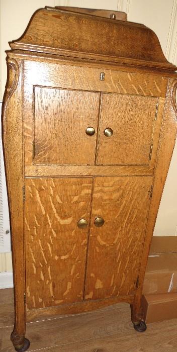 Antique Oak Cabinet...Perfect for storage...Many other beautiful items t/o this home...Call for more info.  615-545-9062...We will be glad to measure for you ....