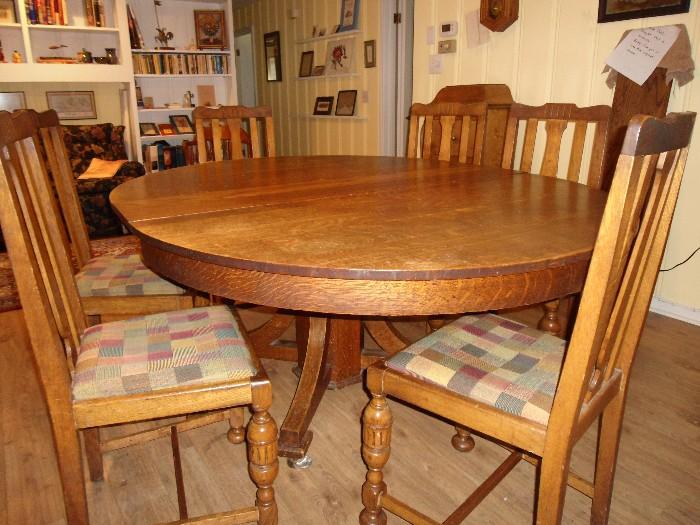 1911 Antique Oak Table and matching chairs..