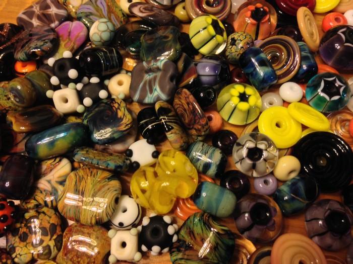 Lots and lots of lampwork glass beads of all shapes and sizes. MADE IN THE USA OF US GLASS