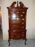 Master Bedroom-First Floor:  Elegant high boy has 12 drawers and measures 37" wide x 19-l/2" deep x 85" tall (to finial top).