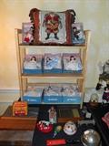 Living Room-SMALLS area:  Small Madame Alexander dolls (three brides-435, two Scarlet-425, one Israel-568, one Scotland-595, one Red Boy-440); vintage Mattel tin wind-up eggs; various tool sets.