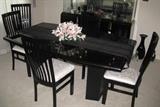 Black Lacquer dining table/chairs by Ashley Furniture industries of Wisconsin