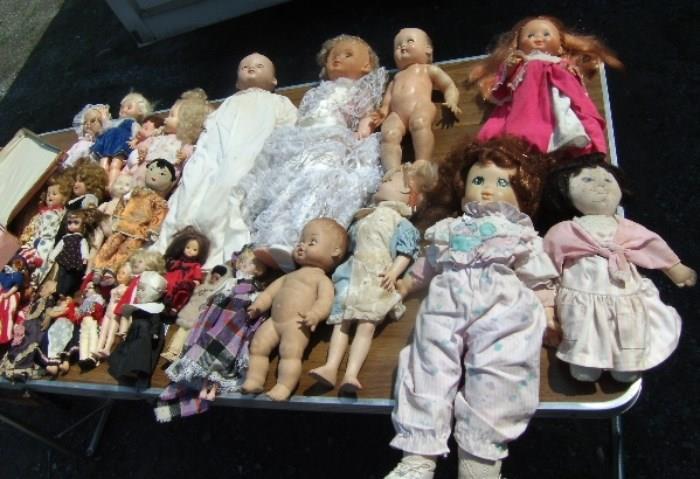 assortment of dolls