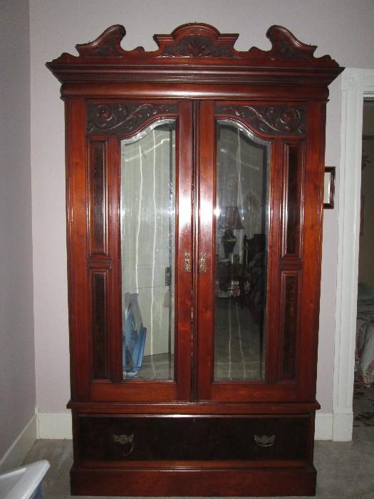 Mahogany mirrored double door antique armoire