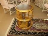 Two Tier Revolving Bookcase Side Table.  Burl Walnut inserts with an antique pecan finish.
