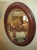 Smoky Finished Mirror - Mahogany Oval Frame  Akins & Associates  27"W x 34"H