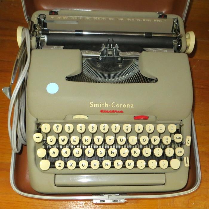 1962 Smith-Corona Electric typewriter with case