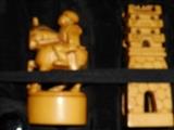 close-up of hand-carved chess figurines