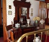 Room filled with treasures. Marble top Eastlake style dresser, old beaded bags, check out that alabaster lamp! 