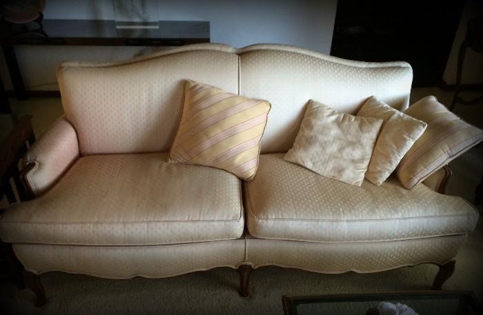 Fantastic antique sofa in neutral color! The next photo shows the sofa with all of the pillows included!