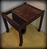 Unique wooden table and magazine holder with caster wheels!