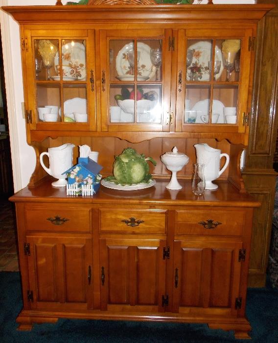 Great china hutch filled with milk glass, grape pattern