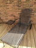 Wrought-iron rolling lounger chair