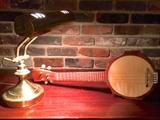 Brass piano lamp and hand-made banjo