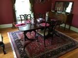 80" mahogany dining table with 5 Chippendale chairs - 2 arm and 3 side chairs; red & blue oriental 8x8