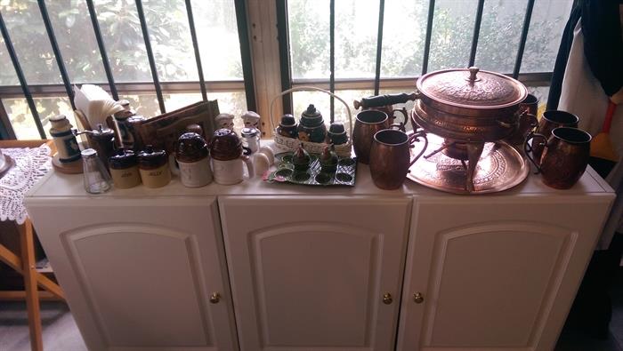 Copper German fondue pot and beer mugs - white cabinet - salt and pepper shakers