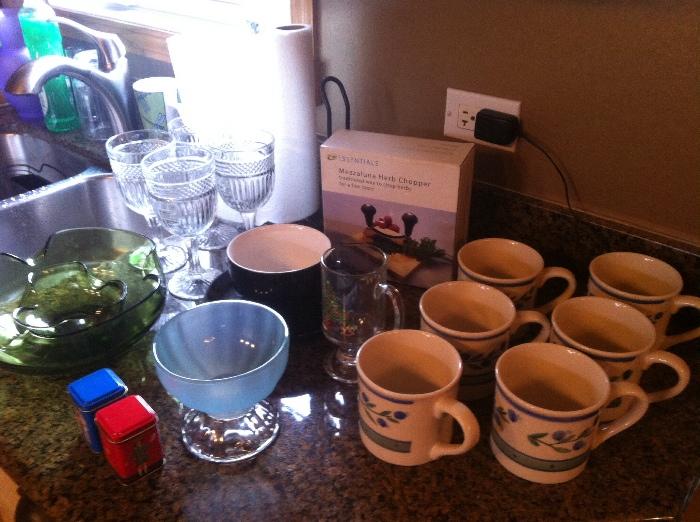 Coffee mugs, glass serving bowls, wine glasses