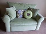 Light Green Loveseat with Pillows