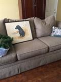                   Large sofa; framed black lab picture