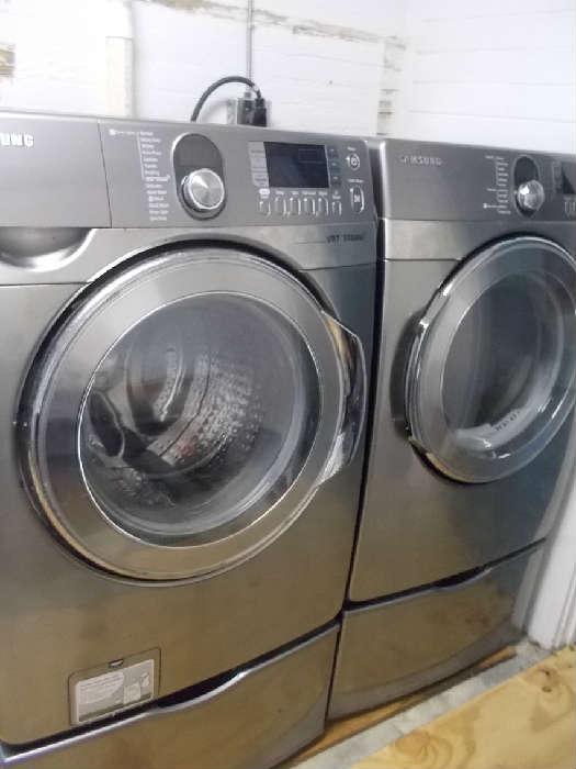 Pair of stainless Samsung washer & dryer, risers will be priced seperately