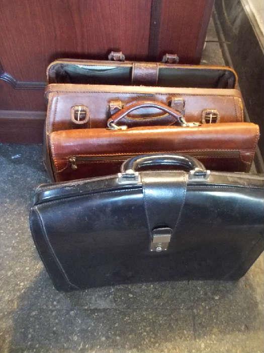 Leather brief cases - front one is in excellent condition and is Italian leather.