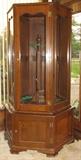 Custom Made Solid Wood Hexagon Display Gun Cabinet. (76" Hx 44"W) The inside Revolving Carousel holds 16 Rifles and is Lighted. Key Lock Upper and Lower Cabinet.