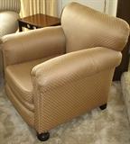 Antique Rolled Arm Easy Chair with Bun Feet Upholstered in coordinating fabric to match the Sofa.