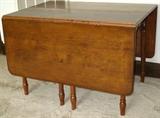 Antique Gate Leg Table. Table with Dropped leaves measures 42" W x 30" D x 29"H. Each drop leaf is 19" Deep. Fully open table would Measure 68" x42"
