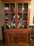 Parquet wood china cabinet, matching buffet, dining table and chairs available (not shown.)