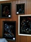 Collection of vintage black velvet paintings, available individually.