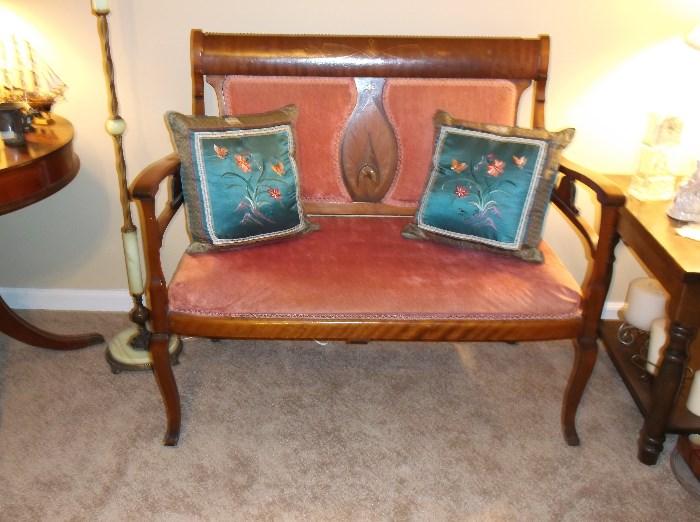 Antique settee with inlaid design