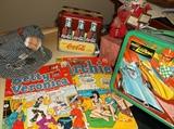 Old comic books, Johnny Lightning metal lunch box, Coke tin