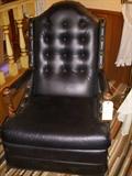 Vinyl upholstered rocker/recliner