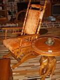 Victorian platform rocker.  Elephant carved stand